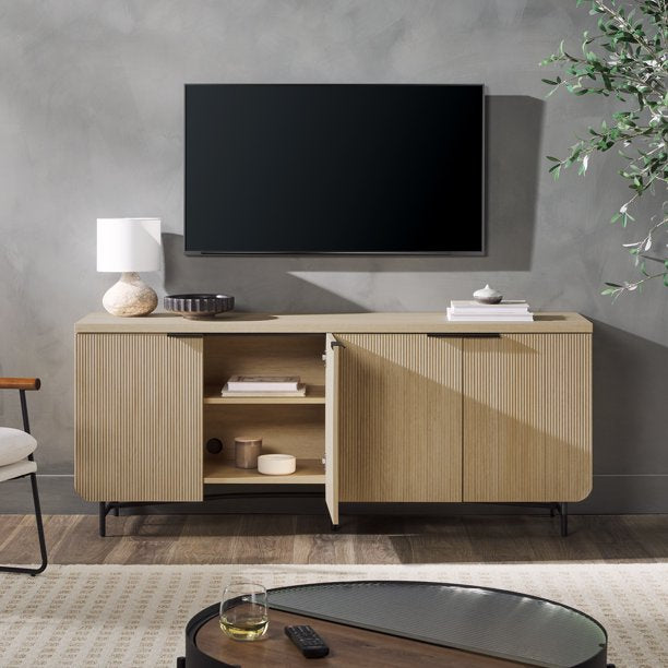 Walker Edison 69โ Scandinavian 4-Door Reeded-Front TV Stand, Coastal Oak/Black - $380