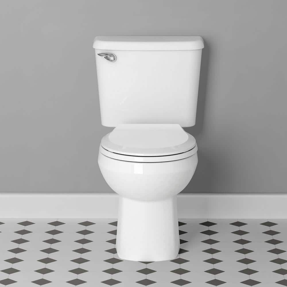Reliant Two-Piece 10 in Rough 1.28 GPF Single Flush Round Standard Height Toilet  - $115
