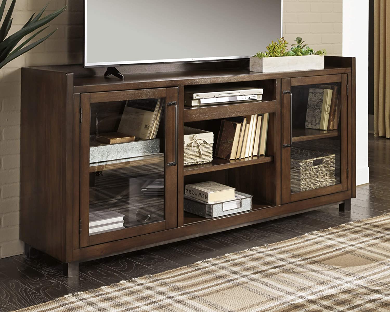 Signature Design by Ashley Starmore Urban TV Stand Fits TVs up to 68",  Brown - $325